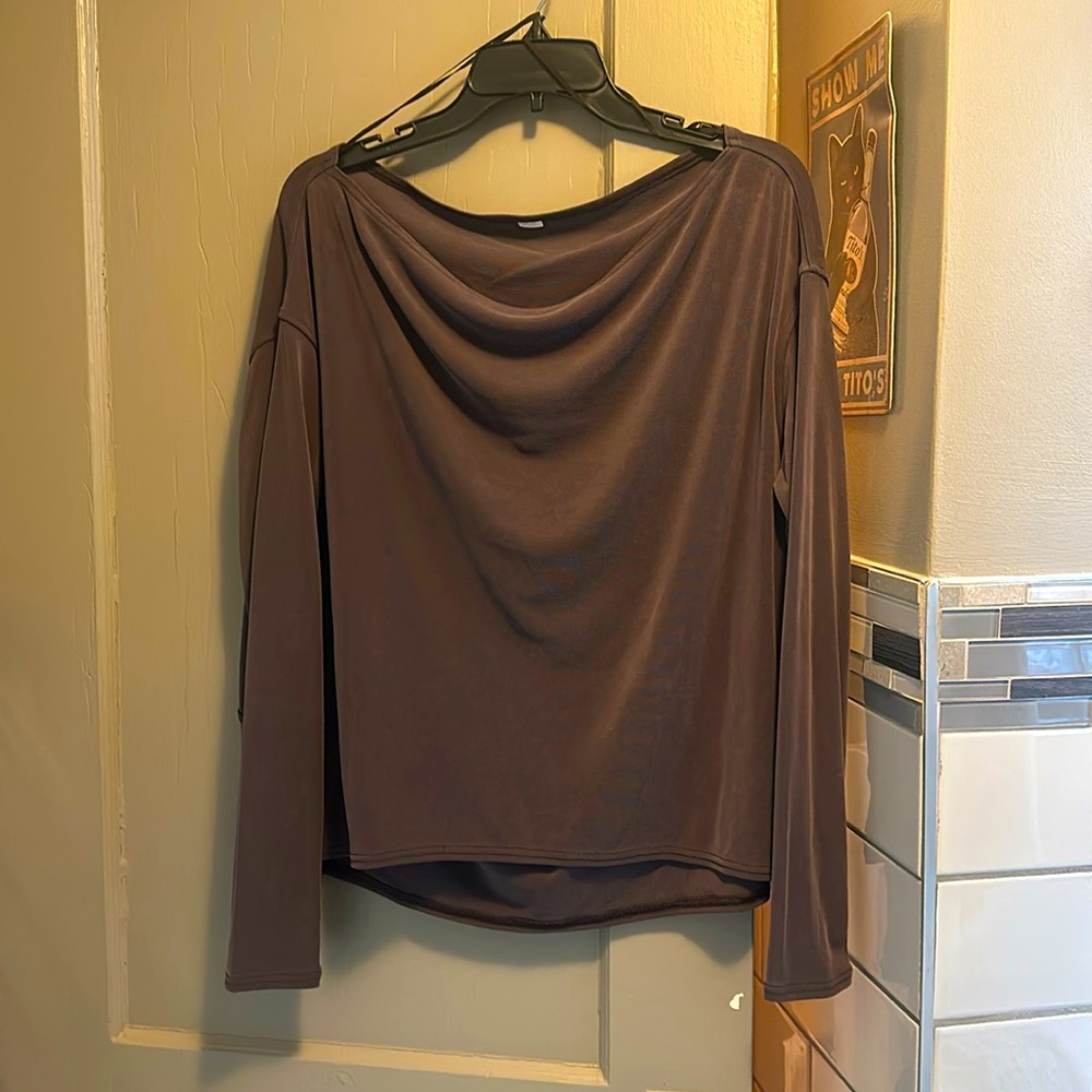 Buttery soft material, this top can be worn to yoga or out to lunch mauve color